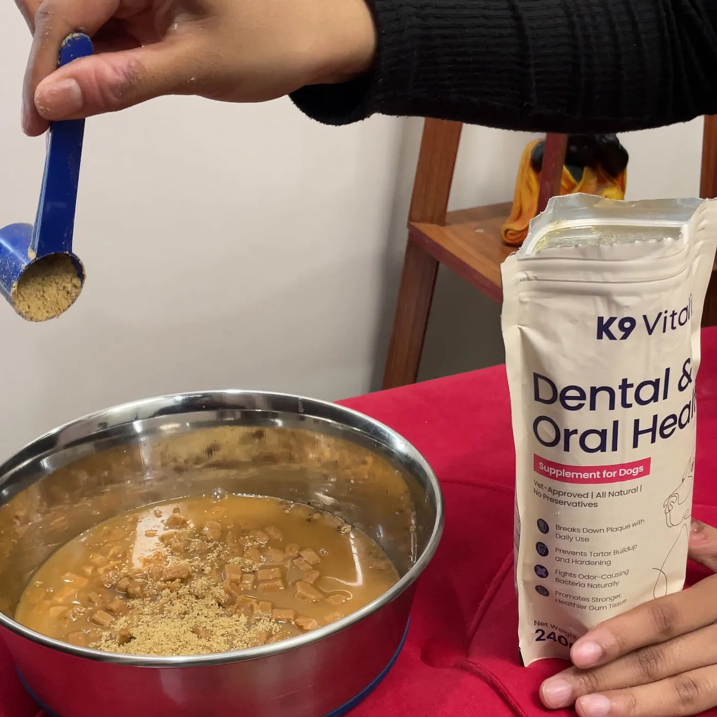 Dental & Oral Health powder on wet food, with the pack beside the bowl